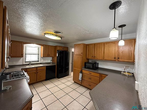 4th image of 303 E Permian Dr