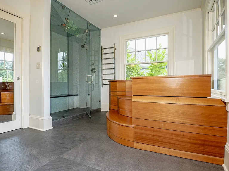 Custom spa in master suite. Japanese hot tub, cold plunge, steam shower with bench with chromatherapy, Japanese bidet.