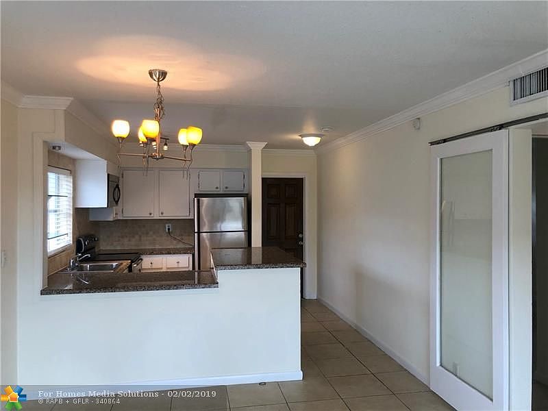 1st image of 1581 NE 34th Ct APT 211