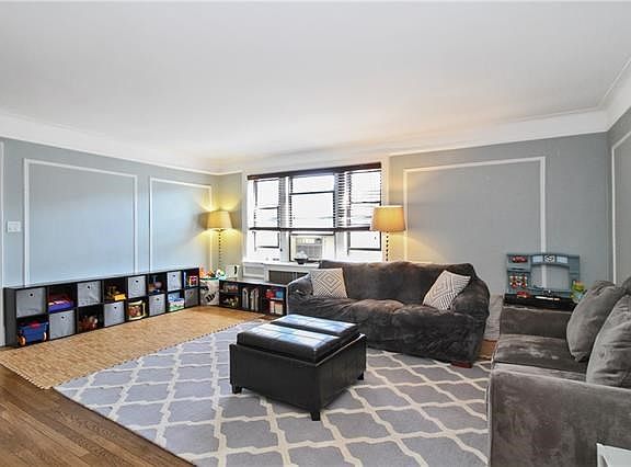 Another look at the living room coming in from the foyer peaking into the dining room