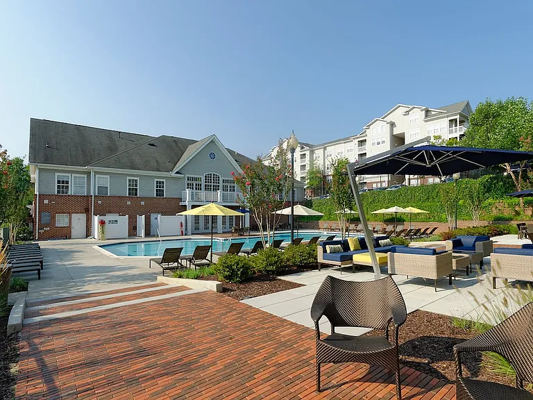 Swimming pool and sundeck with lounge seating