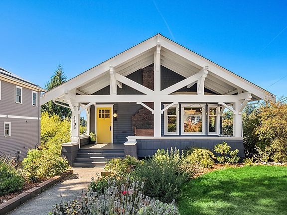 Stunning Craftsman on a gorgeous lot with fully fenced backyard and designer touches throughout.