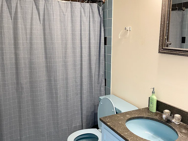 Master Bath with new white tile floor