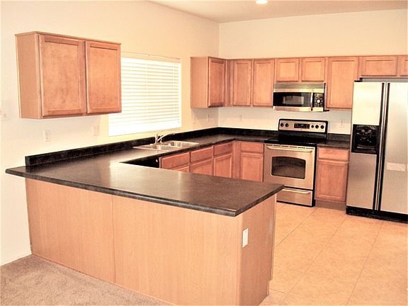 4th image of 10242 W Luxton Ln
