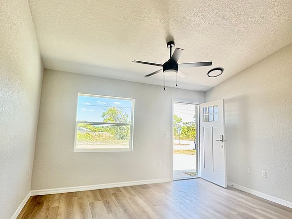 Open concept looking into Living room from Kitchen