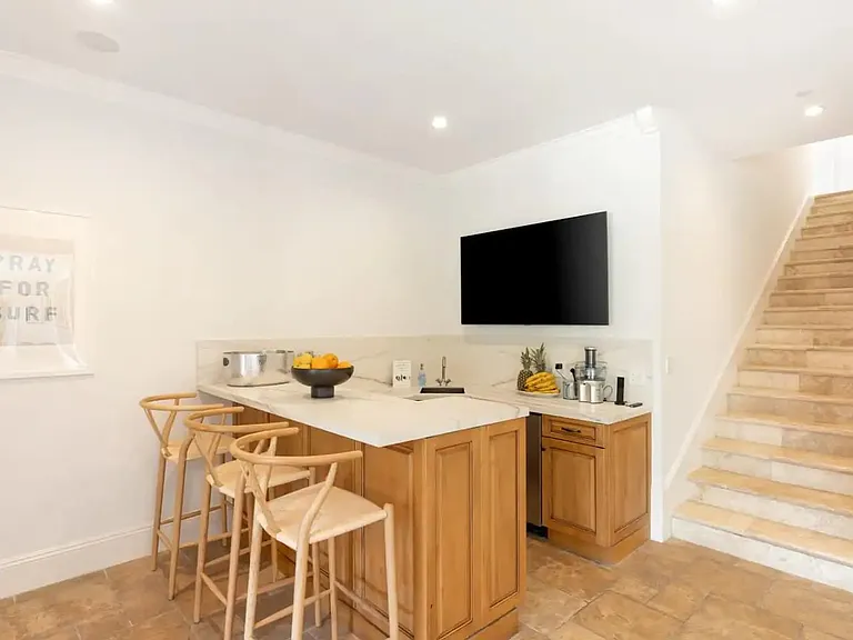 Juice bar with TV and surround sound with subwoofer