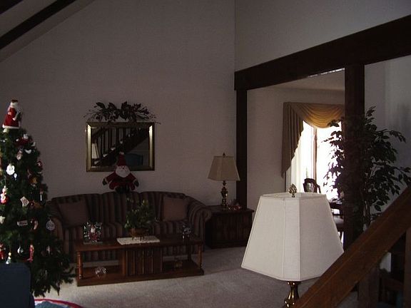 Formal living room has vaulted/beamed ceiling