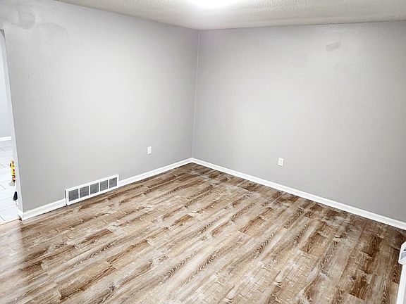 Living room features LVT flooring