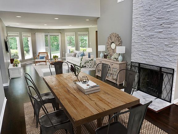 Dining room at the front of the house; photo taken facing the living room and back patio.