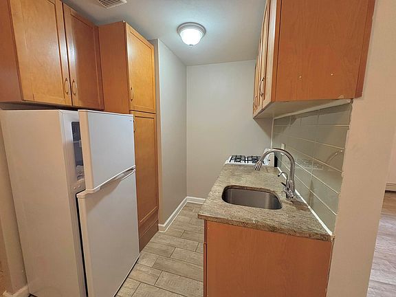 4th image of 61-33 69th St #1