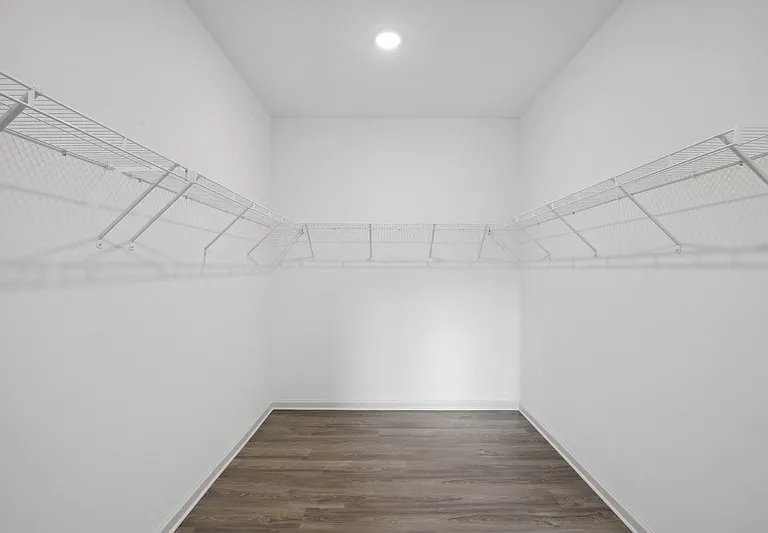 Full size walk in closet.