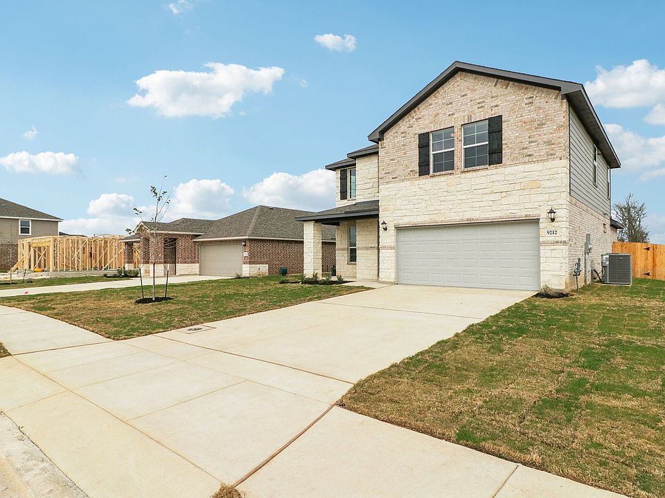 Front exterior of the Medina floorplan at a Meritage Homes community.