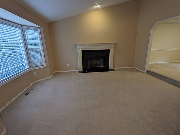 Spacious living room with fireplace
