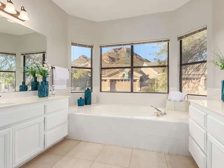 Huge master bath with garden tub, also has a stand-alone shower, double sinks, and, private toilet, plenty of linen cupboards, and large walk in closet