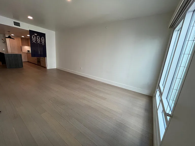 West-facing living room with view of interior garden