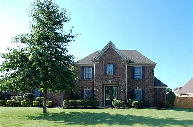 Exterior view of this elegant four bedroom, three bathroom home