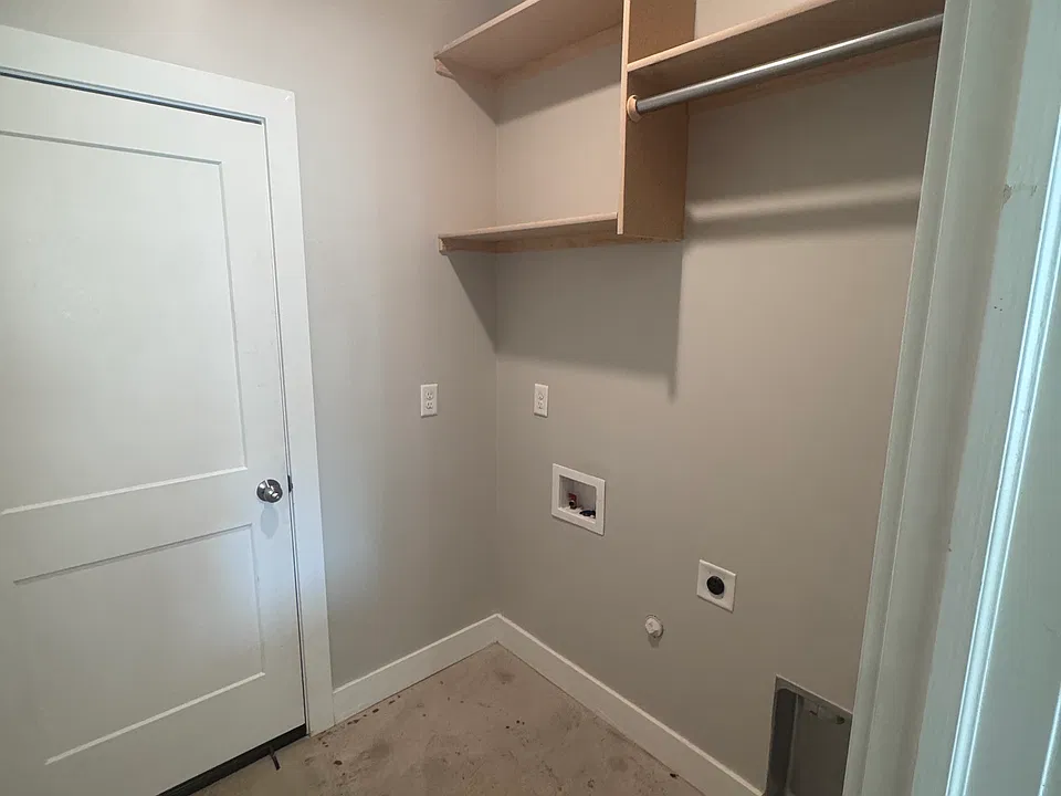 Laundry off of Kitchen leading out to Garage