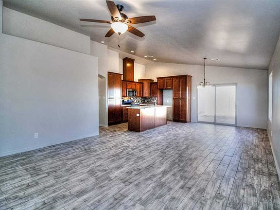 4th image of 8707 E 34th Pl