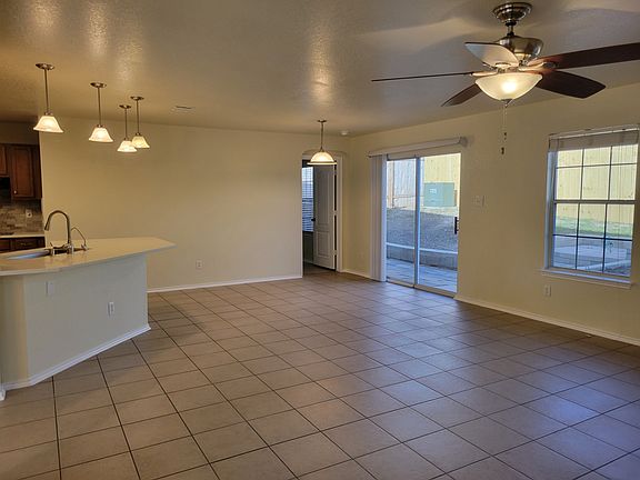 Open floor plan offers flexible furniture placement and easy flow throughout the home.