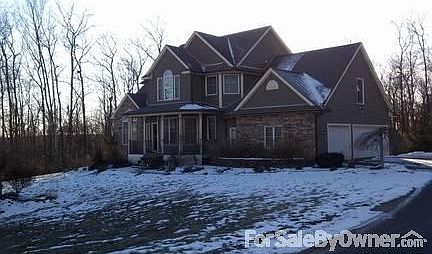 Beautiful Custom Home
						:
						Professionally landscaped yard; stone walls compliment stone front of house