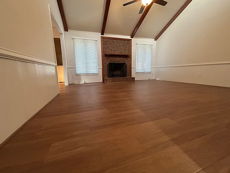 Family room with vaulted ceiling