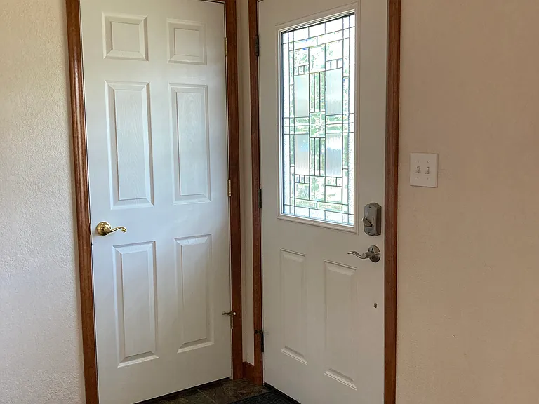 Tiled from entrance and coat closet