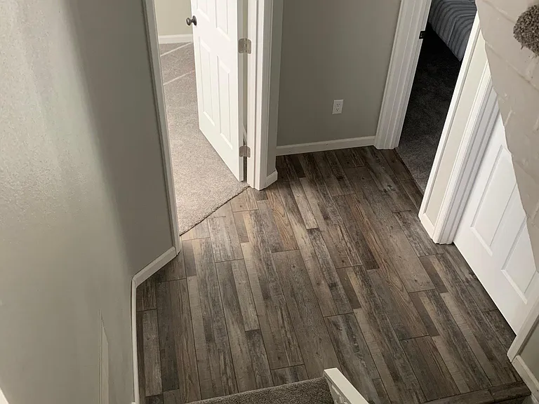 Bedroom 3 (left), Bedroom 4 (far right), Door to laundry room and 3rd bathroom