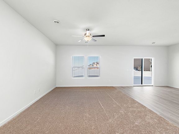 The family room and living room are open-concept, making it easy to host
