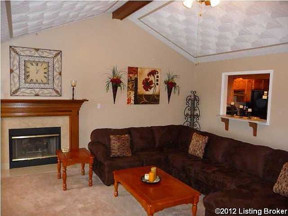 Large great room with vaulted ceiling.