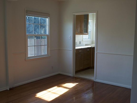 Dining room leading into the kitchen