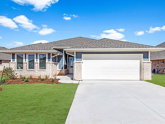 Homes by Taber Kamber B Elevation - 9125 NW 119th