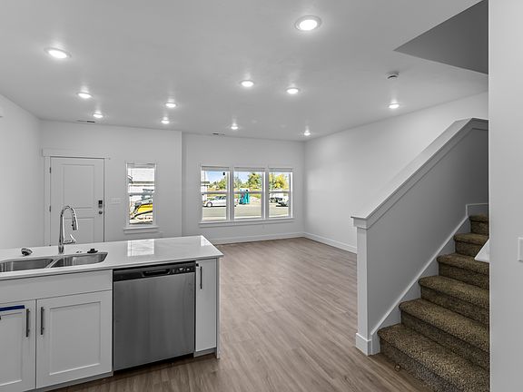 Kitchen and stairs to upstairs