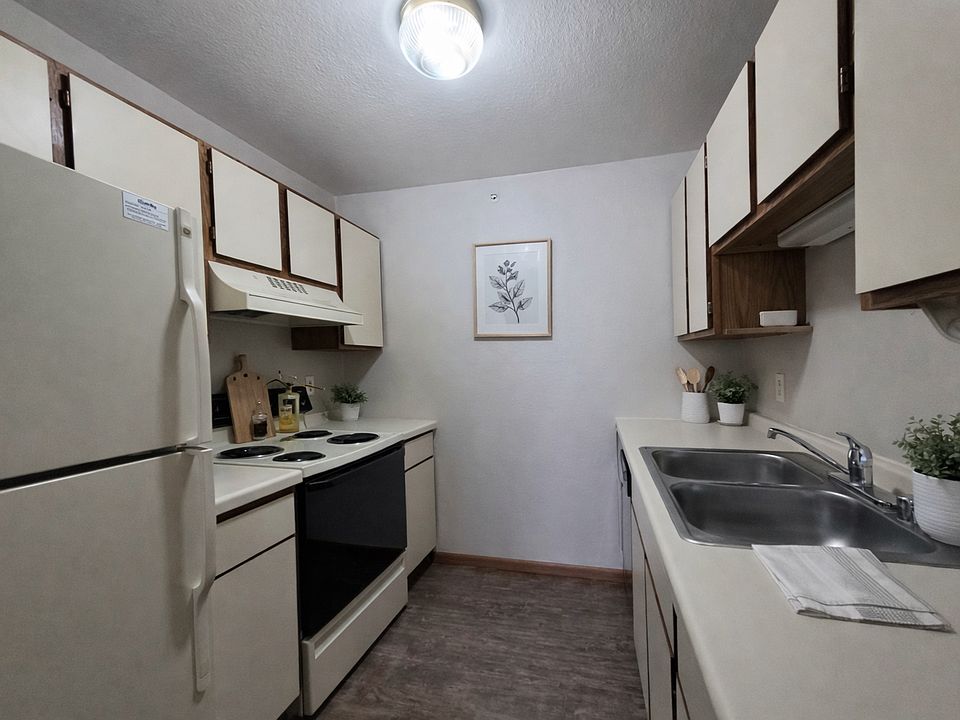 This is a staged photo. This unit does not come furnished. Each unit varies on finishes and layout.