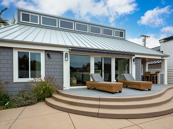 Front patio with lounge chairs. Our home is the perfect set up for your summer vacation!