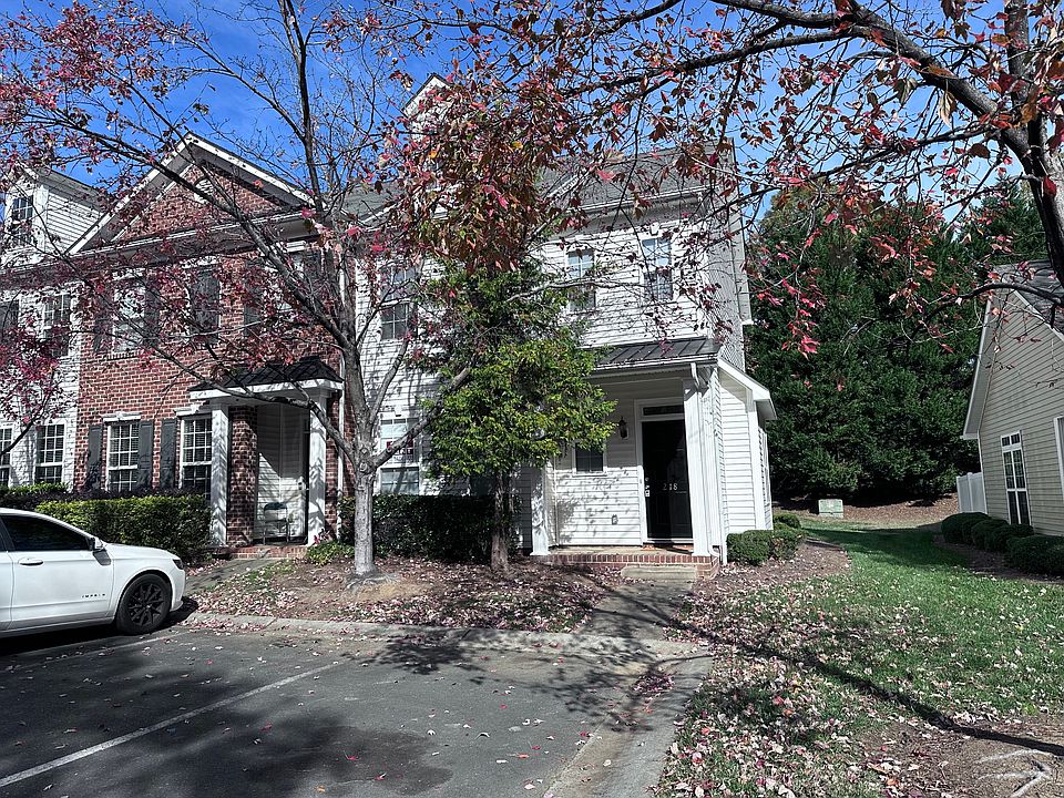 A beautiful and welcoming end-unit townhome with a charming front yard and excellent curb appeal, located in the desirable Regent Park neighborhood.