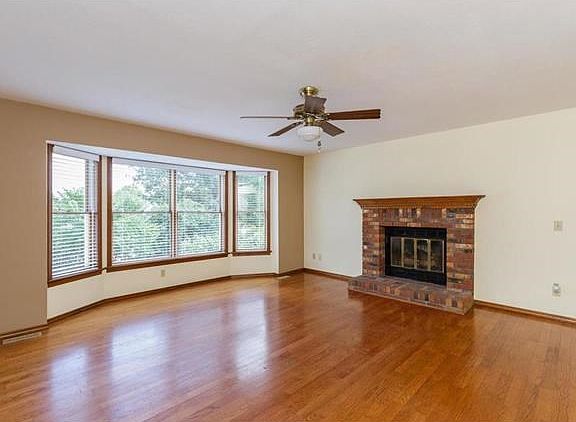 Family Room with Brick Surround Gas Fireplace