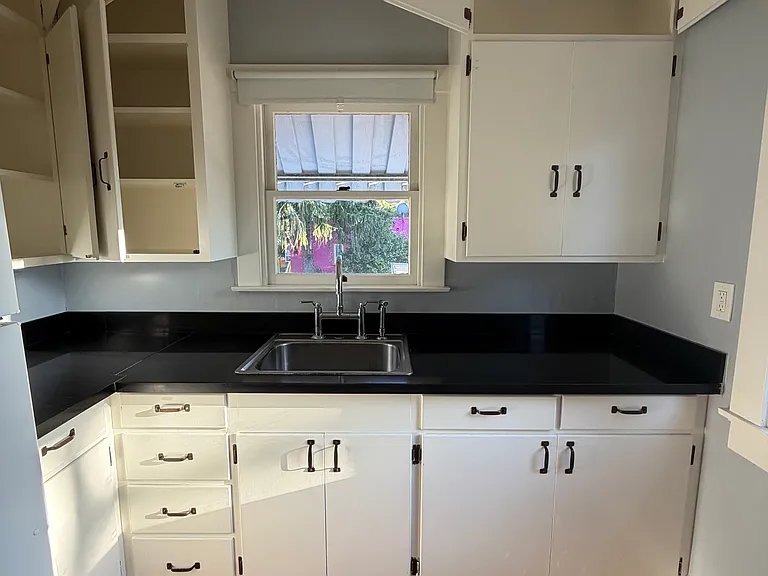 The kitchen features pleasant views and good counter and cabinet space.