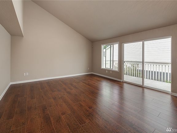 Vaulted ceilings with loft above living room
