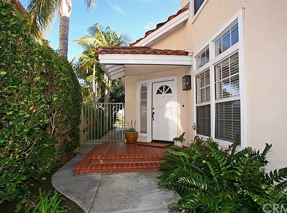 Private Gated Courtyard leads to the Front Door and Access to the Back Yard