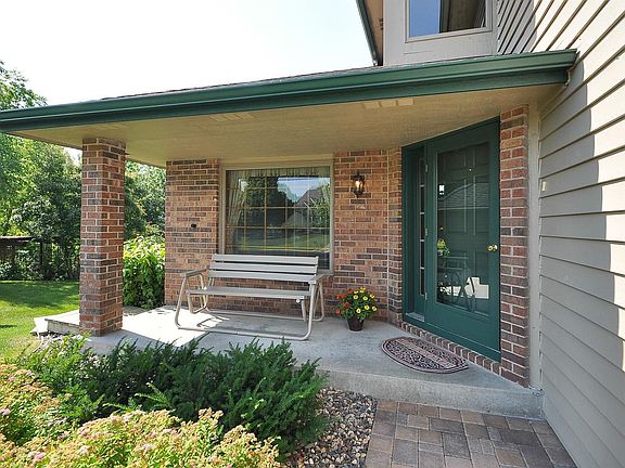 Welcoming entrance with pavered sidewalk!