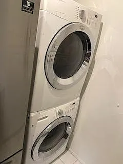 Full size washing machine and dryer, which is incredibly wonderful to have inside your unit!