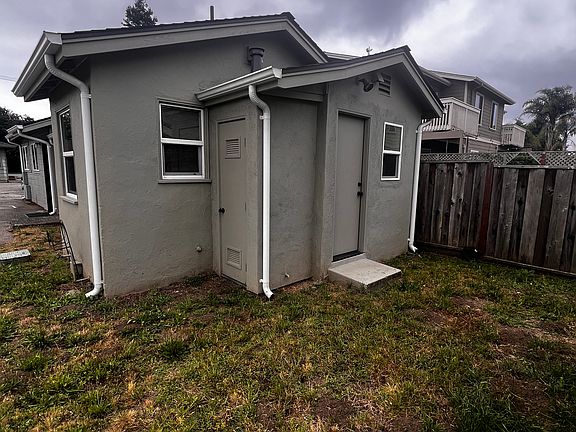 Side of unit B cottage with exterior door