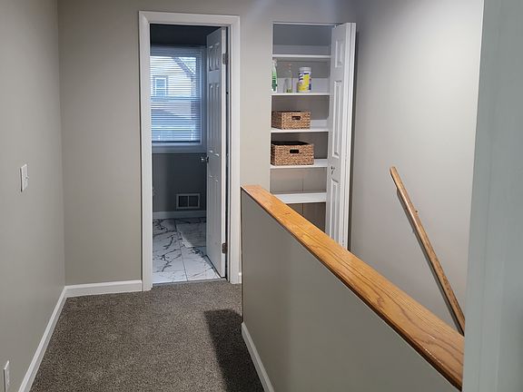 Upstairs Hallway with linen closet