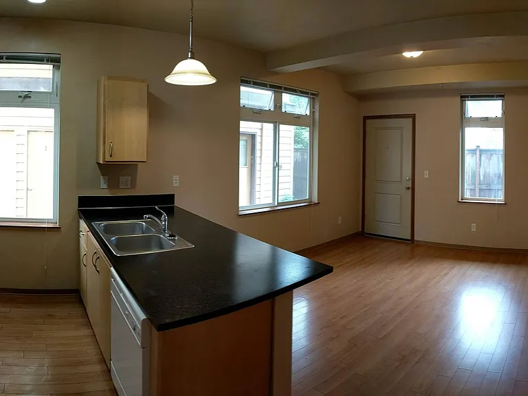 717 E 19th Alley - Living Area and Kitchen 717 E 19th Alley - Living Area and Kitchen