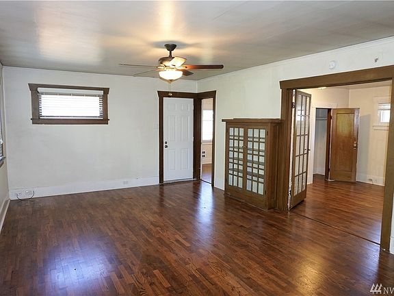 View of part of the family room, master bedroom & 2nd bedroom in the back.