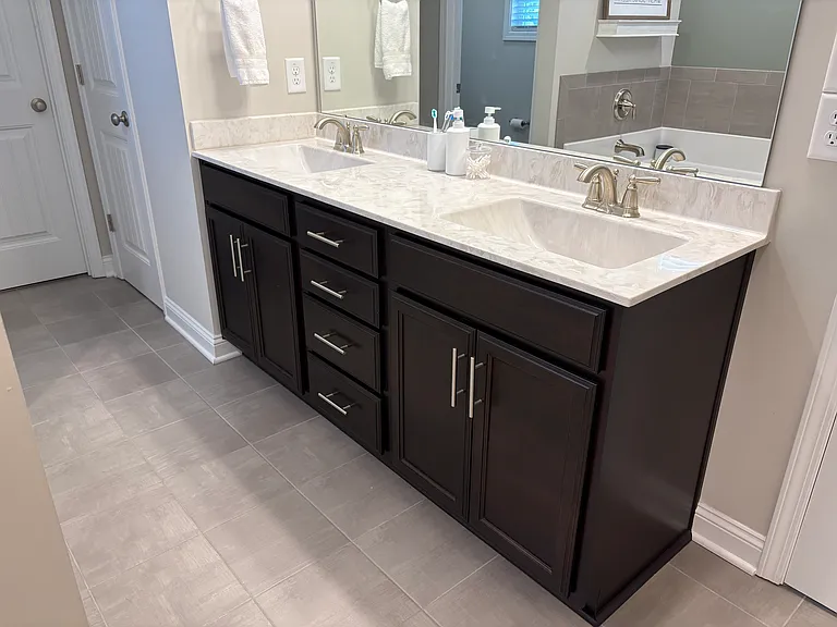 Primary bath with separate water closet and walk through to walk-in closet