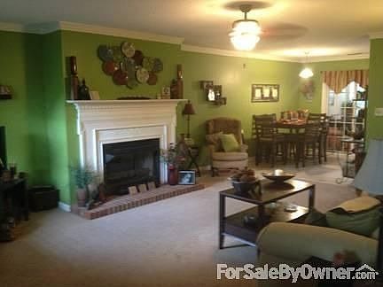 Den and Eating Area
						:
						Gorgeous area with mantle and gas logs.
