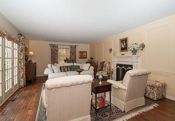 Living room has fireplace