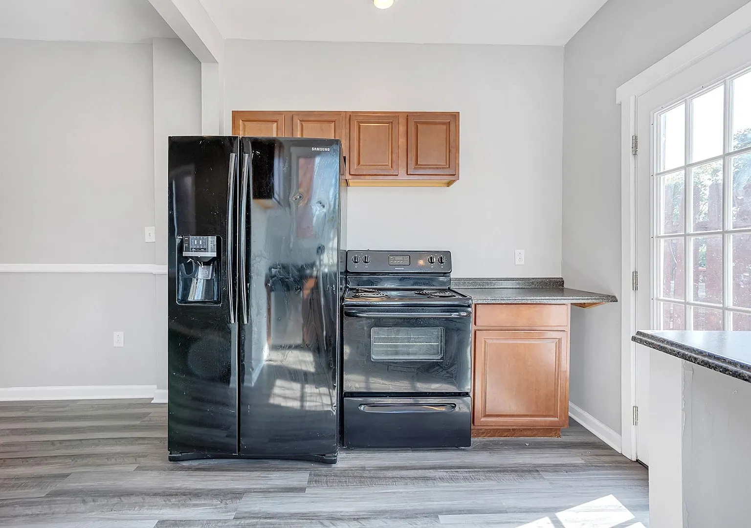 Spacious Two Bed Available July 10th! Central Air, Dishwasher, Laundry, Off Street Parking! — Photo 3