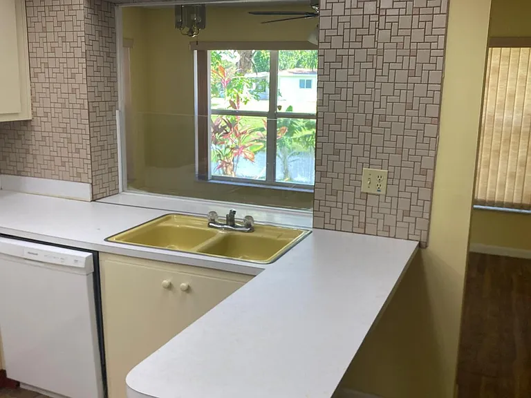 7195 NW 9th Ct — Photo 11